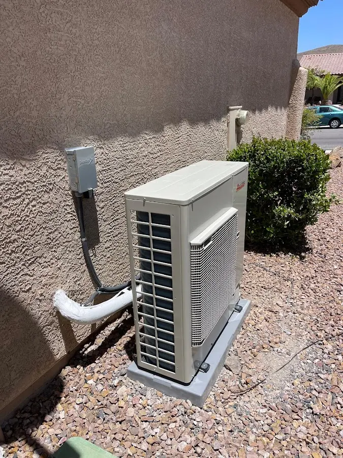 Residential air conditioning condenser unit in Paradise